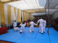 School students displaying Judo skills