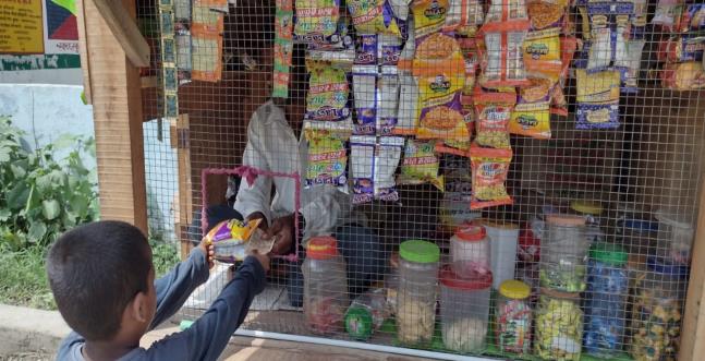 Ved Ram doing good business in his little shop