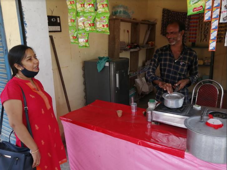 Narendra Kumar Pandey in his tea stall making tea