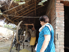 Client trained in Fatehpur Project using fodder cutting machine